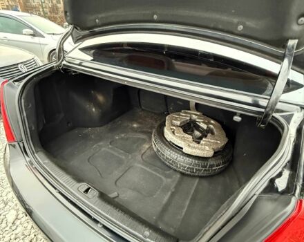 Черный Киа Черато, объемом двигателя 1.6 л и пробегом 258 тыс. км за 5200 $, фото 10 на Automoto.ua