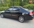 Чорний Кіа Черато, об'ємом двигуна 1.6 л та пробігом 200 тис. км за 4500 $, фото 3 на Automoto.ua