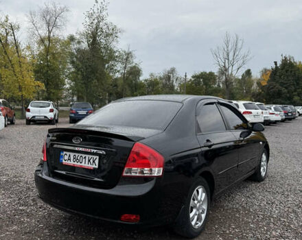Черный Киа Черато, объемом двигателя 1.59 л и пробегом 16 тыс. км за 9500 $, фото 4 на Automoto.ua