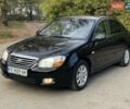 Черный Киа Черато, объемом двигателя 2 л и пробегом 173 тыс. км за 4800 $, фото 7 на Automoto.ua