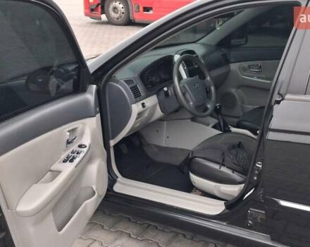 Кіа Черато 2008 у Кременчуге на Automoto.ua Чорний Кіа Черато, об'ємом двигуна 2 л та пробігом 193 тис. км за 5300 $, фото 9 на Automoto.ua