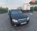 Черный Киа Черато, объемом двигателя 1.59 л и пробегом 345 тыс. км за 2250 $, фото 1 на Automoto.ua