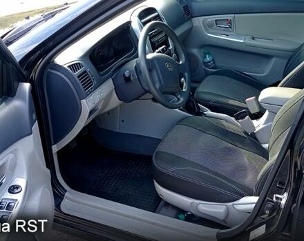 Черный Киа Черато, объемом двигателя 1.6 л и пробегом 178 тыс. км за 5500 $, фото 8 на Automoto.ua