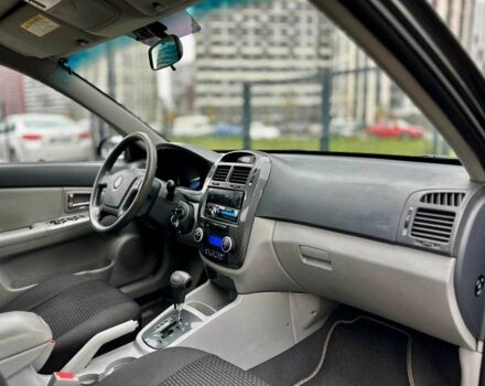 Чорний Кіа Черато, об'ємом двигуна 2 л та пробігом 270 тис. км за 4000 $, фото 13 на Automoto.ua