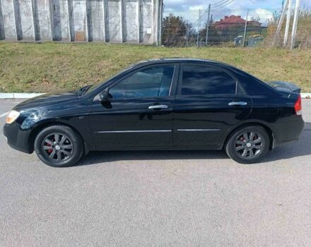 Черный Киа Черато, объемом двигателя 2 л и пробегом 295 тыс. км за 5000 $, фото 18 на Automoto.ua