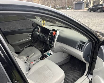 Чорний Кіа Черато, об'ємом двигуна 1.6 л та пробігом 300 тис. км за 4700 $, фото 6 на Automoto.ua