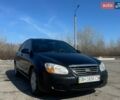 Черный Киа Черато, объемом двигателя 1.58 л и пробегом 529 тыс. км за 2899 $, фото 1 на Automoto.ua