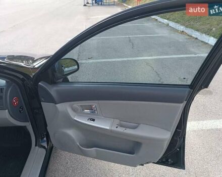 Черный Киа Черато, объемом двигателя 2 л и пробегом 298 тыс. км за 4250 $, фото 14 на Automoto.ua