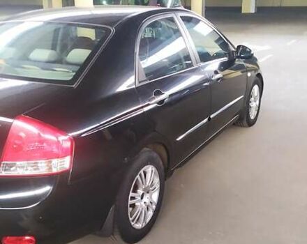 Черный Киа Черато, объемом двигателя 1.6 л и пробегом 188 тыс. км за 5200 $, фото 2 на Automoto.ua