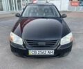 Чорний Кіа Черато, об'ємом двигуна 1.6 л та пробігом 299 тис. км за 4500 $, фото 7 на Automoto.ua