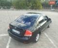 Черный Киа Черато, объемом двигателя 1.6 л и пробегом 200 тыс. км за 4900 $, фото 8 на Automoto.ua