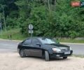 Черный Киа Черато, объемом двигателя 2 л и пробегом 298 тыс. км за 4250 $, фото 1 на Automoto.ua