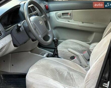 Чорний Кіа Черато, об'ємом двигуна 1.6 л та пробігом 239 тис. км за 5390 $, фото 6 на Automoto.ua