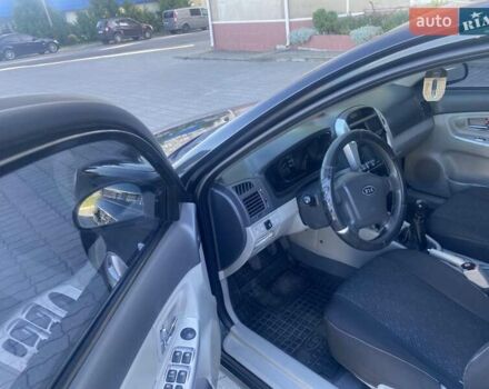 Черный Киа Черато, объемом двигателя 1.59 л и пробегом 166 тыс. км за 4600 $, фото 9 на Automoto.ua