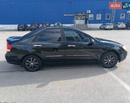 Черный Киа Черато, объемом двигателя 2 л и пробегом 298 тыс. км за 4250 $, фото 8 на Automoto.ua