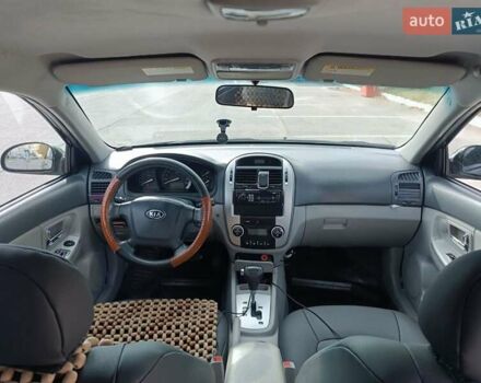 Черный Киа Черато, объемом двигателя 2 л и пробегом 298 тыс. км за 4250 $, фото 11 на Automoto.ua