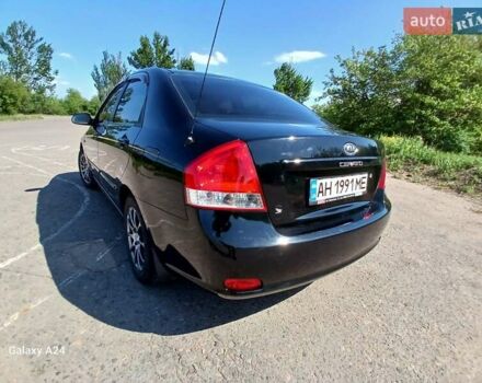 Черный Киа Черато, объемом двигателя 1.6 л и пробегом 225 тыс. км за 5200 $, фото 6 на Automoto.ua