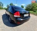 Черный Киа Черато, объемом двигателя 1.6 л и пробегом 225 тыс. км за 5200 $, фото 6 на Automoto.ua
