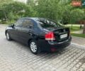 Черный Киа Черато, объемом двигателя 1.98 л и пробегом 258 тыс. км за 5100 $, фото 1 на Automoto.ua