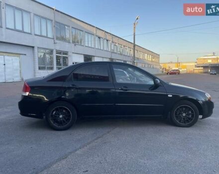 Чорний Кіа Черато, об'ємом двигуна 1.6 л та пробігом 299 тис. км за 4500 $, фото 5 на Automoto.ua