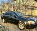 Черный Киа Черато, объемом двигателя 1.59 л и пробегом 305 тыс. км за 3800 $, фото 1 на Automoto.ua