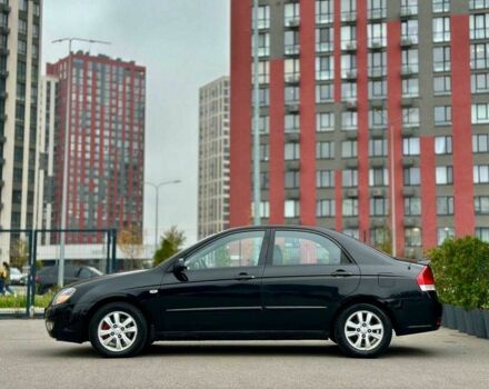 Чорний Кіа Черато, об'ємом двигуна 2 л та пробігом 270 тис. км за 4000 $, фото 7 на Automoto.ua