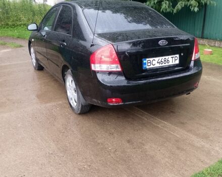 Черный Киа Черато, объемом двигателя 1.6 л и пробегом 208 тыс. км за 4700 $, фото 5 на Automoto.ua