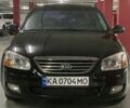 Черный Киа Черато, объемом двигателя 1.98 л и пробегом 223 тыс. км за 3950 $, фото 1 на Automoto.ua