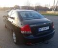 Чорний Кіа Черато, об'ємом двигуна 1.6 л та пробігом 232 тис. км за 4250 $, фото 2 на Automoto.ua