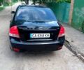 Черный Киа Черато, объемом двигателя 1.6 л и пробегом 297 тыс. км за 3500 $, фото 1 на Automoto.ua