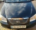 Чорний Кіа Черато, об'ємом двигуна 1.59 л та пробігом 184 тис. км за 5300 $, фото 1 на Automoto.ua