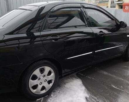 Черный Киа Черато, объемом двигателя 1.6 л и пробегом 192 тыс. км за 4250 $, фото 3 на Automoto.ua