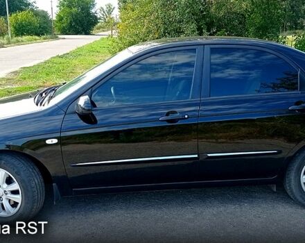 Черный Киа Черато, объемом двигателя 1.6 л и пробегом 178 тыс. км за 5500 $, фото 7 на Automoto.ua