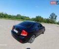 Черный Киа Черато, объемом двигателя 1.6 л и пробегом 225 тыс. км за 5200 $, фото 5 на Automoto.ua