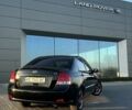 Черный Киа Черато, объемом двигателя 1.6 л и пробегом 315 тыс. км за 4999 $, фото 1 на Automoto.ua
