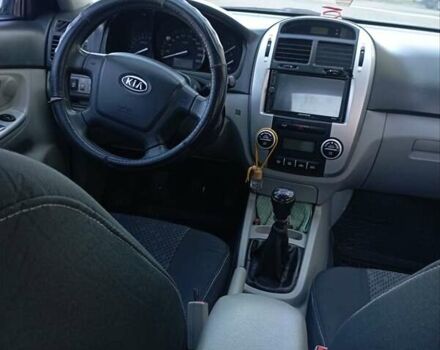 Черный Киа Черато, объемом двигателя 1.59 л и пробегом 166 тыс. км за 4600 $, фото 18 на Automoto.ua