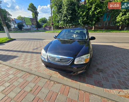 Черный Киа Черато, объемом двигателя 1.6 л и пробегом 232 тыс. км за 4000 $, фото 1 на Automoto.ua