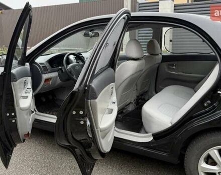 Черный Киа Черато, объемом двигателя 2 л и пробегом 186 тыс. км за 4999 $, фото 2 на Automoto.ua