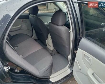 Черный Киа Черато, объемом двигателя 1.6 л и пробегом 260 тыс. км за 3800 $, фото 1 на Automoto.ua