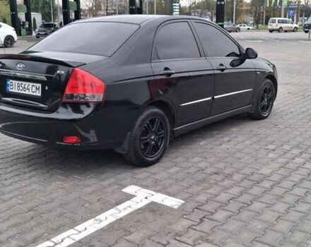 Кіа Черато 2008 у Кременчуге на Automoto.ua Чорний Кіа Черато, об'ємом двигуна 2 л та пробігом 193 тис. км за 5300 $, фото 3 на Automoto.ua