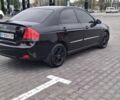 Кіа Черато 2008 у Кременчуге на Automoto.ua Чорний Кіа Черато, об'ємом двигуна 2 л та пробігом 193 тис. км за 5300 $, фото 3 на Automoto.ua