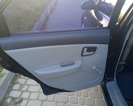 Чорний Кіа Черато, об'ємом двигуна 1.6 л та пробігом 232 тис. км за 4250 $, фото 16 на Automoto.ua