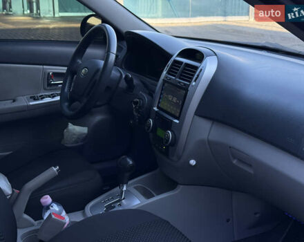 Черный Киа Черато, объемом двигателя 1.98 л и пробегом 180 тыс. км за 5750 $, фото 25 на Automoto.ua