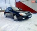 Чорний Кіа Черато, об'ємом двигуна 1.6 л та пробігом 205 тис. км за 5200 $, фото 1 на Automoto.ua