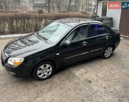 Черный Киа Черато, объемом двигателя 1.6 л и пробегом 185 тыс. км за 4700 $, фото 11 на Automoto.ua