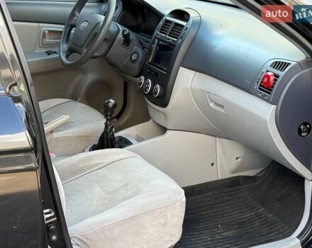 Чорний Кіа Черато, об'ємом двигуна 1.6 л та пробігом 239 тис. км за 5390 $, фото 12 на Automoto.ua