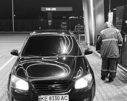 Чорний Кіа Черато, об'ємом двигуна 1.6 л та пробігом 300 тис. км за 4700 $, фото 8 на Automoto.ua