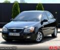 Черный Киа Черато, объемом двигателя 2 л и пробегом 241 тыс. км за 5199 $, фото 1 на Automoto.ua
