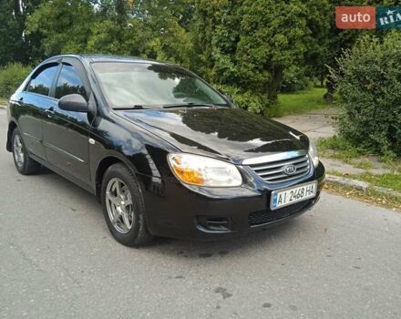 Чорний Кіа Черато, об'ємом двигуна 1.6 л та пробігом 200 тис. км за 4500 $, фото 12 на Automoto.ua
