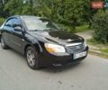 Чорний Кіа Черато, об'ємом двигуна 1.6 л та пробігом 200 тис. км за 4500 $, фото 12 на Automoto.ua